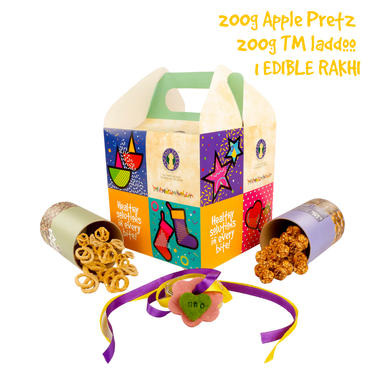 Edible rakhi combo for dogs with Apple Pretz and TM Laddoo treats
Tailtale rakhi gift box with natural sweets and pet-safe rakhi
Dog rakhi gift box with heart-shaped edible rakhi on ribbon
Unboxing Apple of My Eye Rakhi combo for dogs
